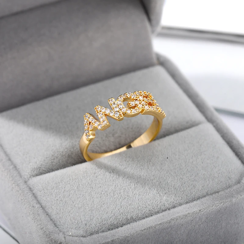 Angel Rings for Women Couple Letter Ring Shiny Zircon Stainless Steel Angel Baby Ring Personality Ring Jewelry Gifts On-Sale
Angel Rings for Women Couple Letter Ring Shiny Zircon Stainless Steel Angel Baby Ring Personality Ring Jewelry Gifts On-Sale