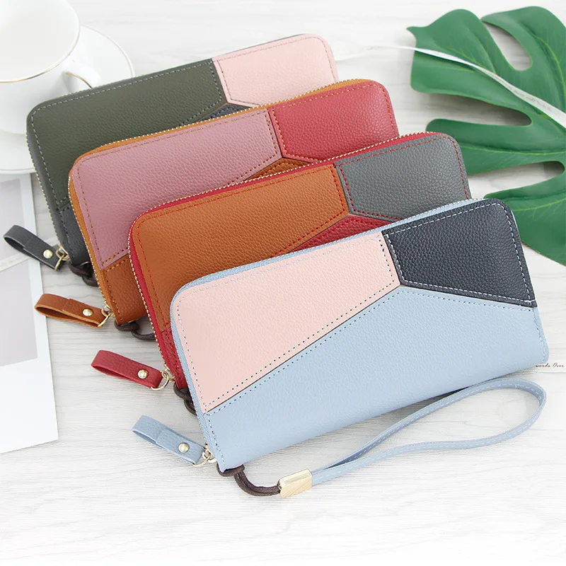 2020 new Korean women's wallet brand geometric stitching PU leather women's long zipper wrist wallet tassel Card package
2020 new Korean women's wallet brand geometric stitching PU leather women's long zipper wrist wallet tassel Card package