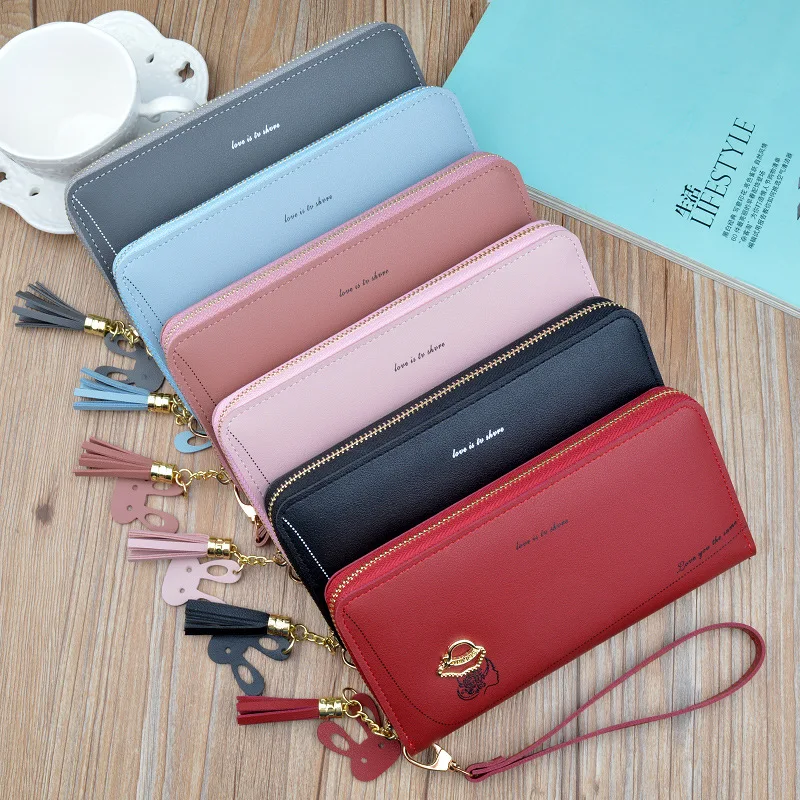 2021 New Women's Wallet Luxury Long Zipper Tassel Cartoon Pictures Letter Wallet Large Capacity Wallet Mobile Phone Bag
2021 New Women's Wallet Luxury Long Zipper Tassel Cartoon Pictures Letter Wallet Large Capacity Wallet Mobile Phone Bag
