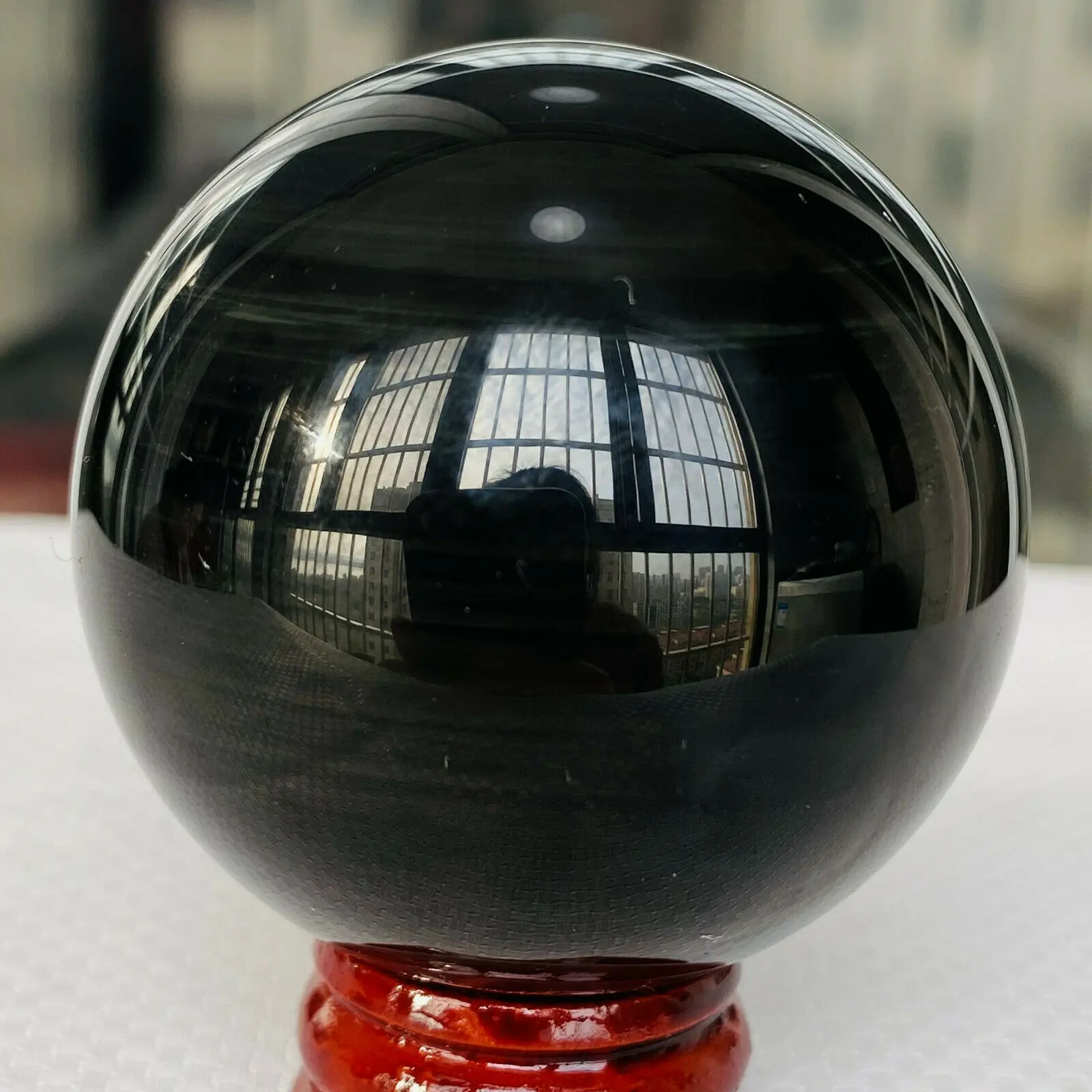 Natural obsidian orb crystal healing stone 
Natural obsidian orb crystal healing stone