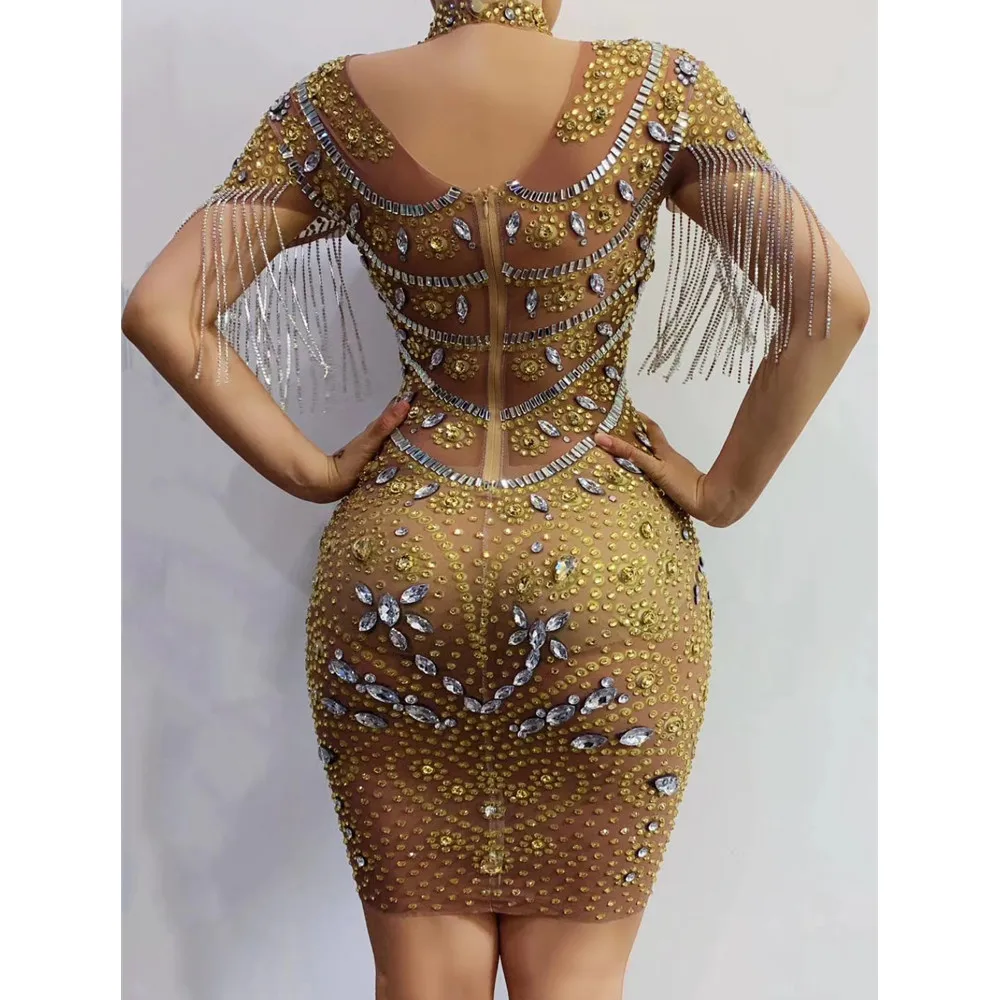 Luxury Golden Women's Rhinestone Tassel Mesh Perspective Bodycon Dress New Nightclub Party Prom Ds Stage Performance Costumes 
Luxury Golden Women's Rhinestone Tassel Mesh Perspective Bodycon Dress New Nightclub Party Prom Ds Stage Performance Costumes