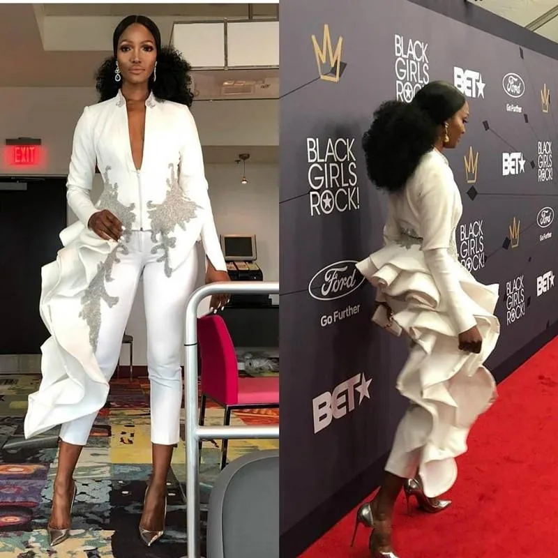 Arabic Dubai African Azzi Osta Jumpsuits Prom Dresses Deep V Neck Long Sleeve Appliqued Tea Length Formal Dress Evening Gowns
Arabic Dubai African Azzi Osta Jumpsuits Prom Dresses Deep V Neck Long Sleeve Appliqued Tea Length Formal Dress Evening Gowns
