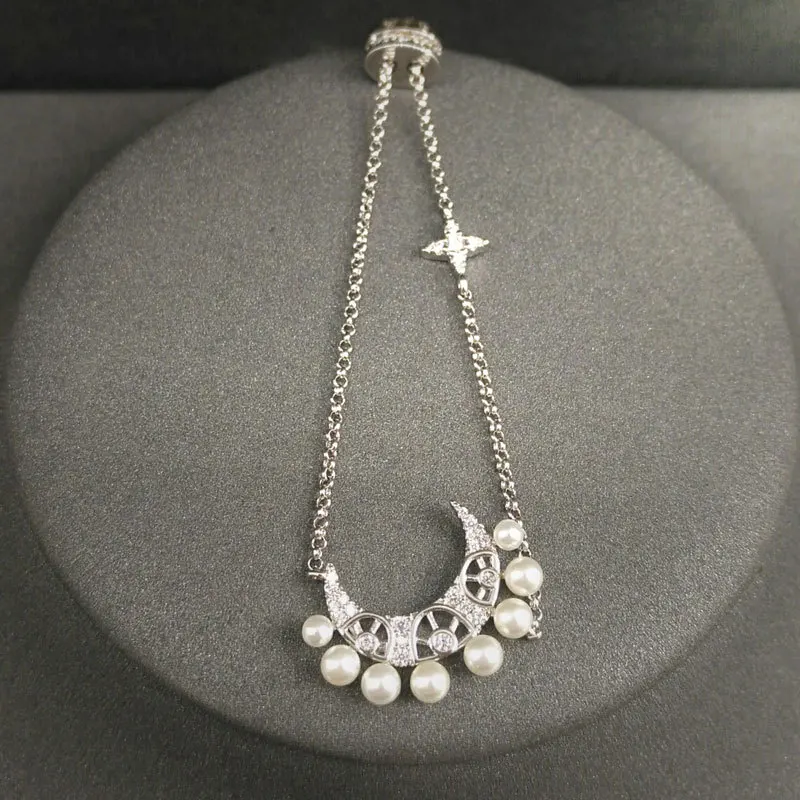 Moon Pearl Adjustable Luxury Bracelet S925 Sterling Silver Bracelet Fashion Brand Original Temperament Elegant Bracelet Jewelry
Moon Pearl Adjustable Luxury Bracelet S925 Sterling Silver Bracelet Fashion Brand Original Temperament Elegant Bracelet Jewelry