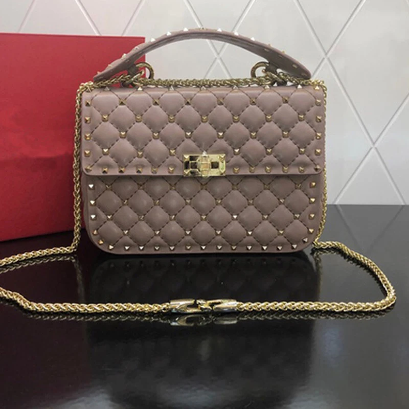 Fashion Luxury Cahin Designer White Real Leather Rivet Small Crossbody Bag for Women 2021 Large-capacity Shopping Bag
Fashion Luxury Cahin Designer White Real Leather Rivet Small Crossbody Bag for Women 2021 Large-capacity Shopping Bag