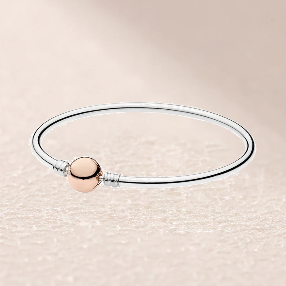 580713-1 MOMENTS BANGLE WITH ROSE CLASP
580713-1 MOMENTS BANGLE WITH ROSE CLASP