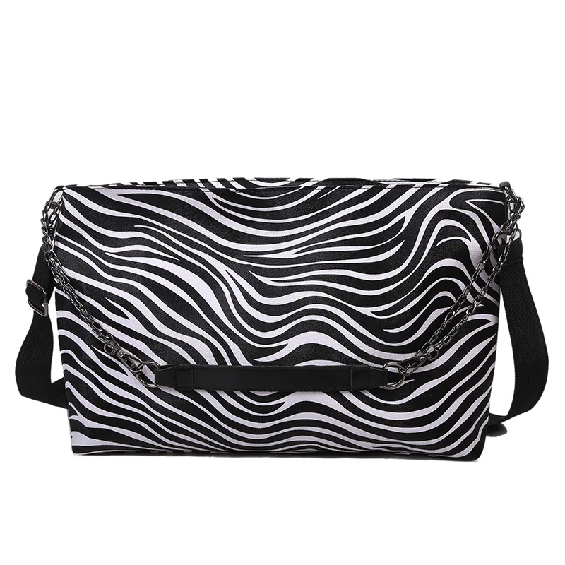 Simple ladies bag new tide net red fashion slung printed bag large capacity casual tote shoulder bag
Simple ladies bag new tide net red fashion slung printed bag large capacity casual tote shoulder bag