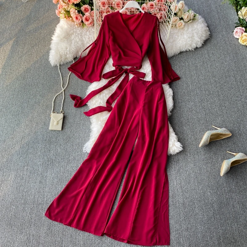 Elegant Fashion Women V-neck Chest Cross Bandage Short Chiffon Flare Sleeve Top + High Waist Split Wide Leg Pants 2-Piece Suit
Elegant Fashion Women V-neck Chest Cross Bandage Short Chiffon Flare Sleeve Top + High Waist Split Wide Leg Pants 2-Piece Suit