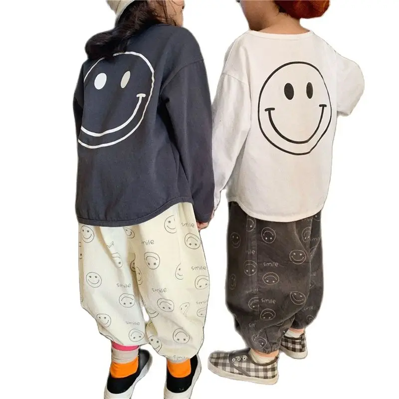 Boys and girls children's bottoming shirts new loose loose round neck smiley face baby long-sleeved T-shirts P4253 P4326
Boys and girls children's bottoming shirts new loose loose round neck smiley face baby long-sleeved T-shirts P4253 P4326