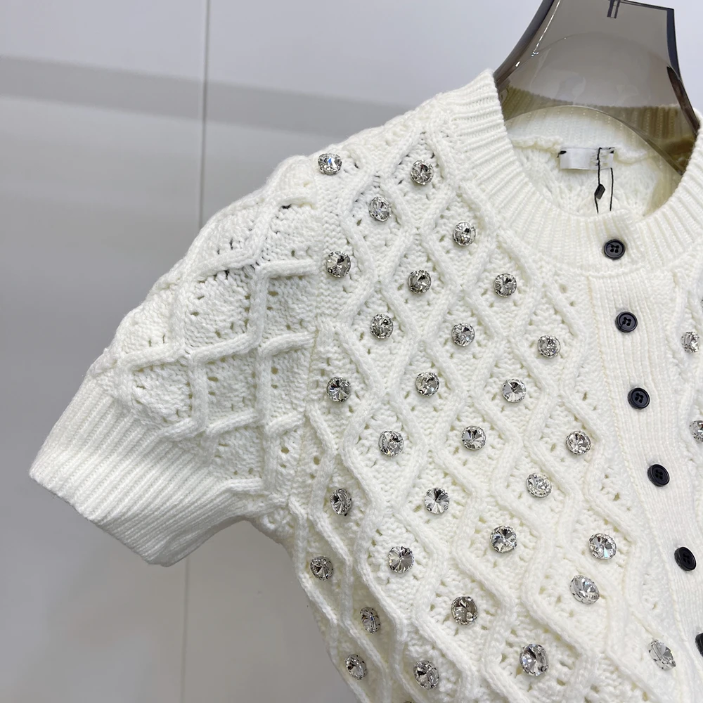 2021 European and American style spring diamond-studded knit short-sleeved cardigan short sleeved cardigan jacket women
2021 European and American style spring diamond-studded knit short-sleeved cardigan short sleeved cardigan jacket women