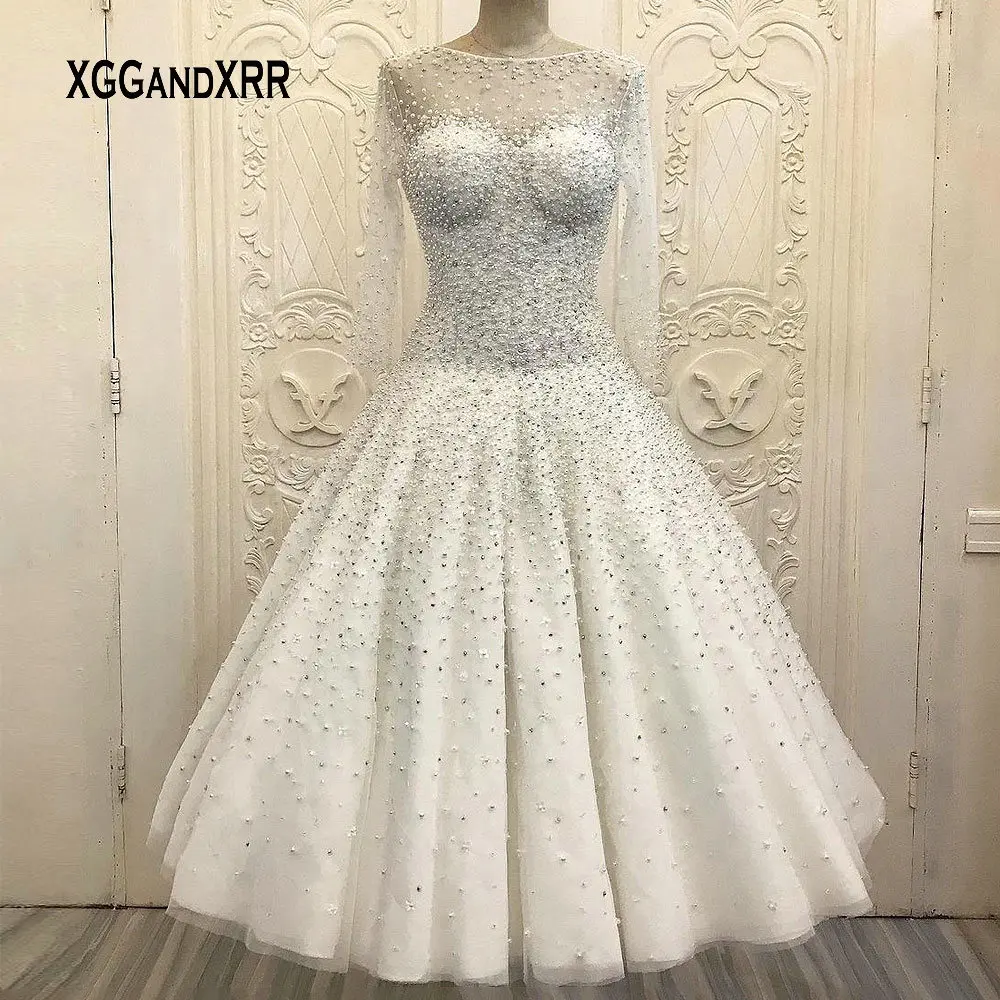 Luxury Pearl Wedding Dress 2021 Long Sleeve Ankle Length Bridal Gown Scoop Illusion Neck Puffy Skirt White Plus Size Custom Made
Luxury Pearl Wedding Dress 2021 Long Sleeve Ankle Length Bridal Gown Scoop Illusion Neck Puffy Skirt White Plus Size Custom Made