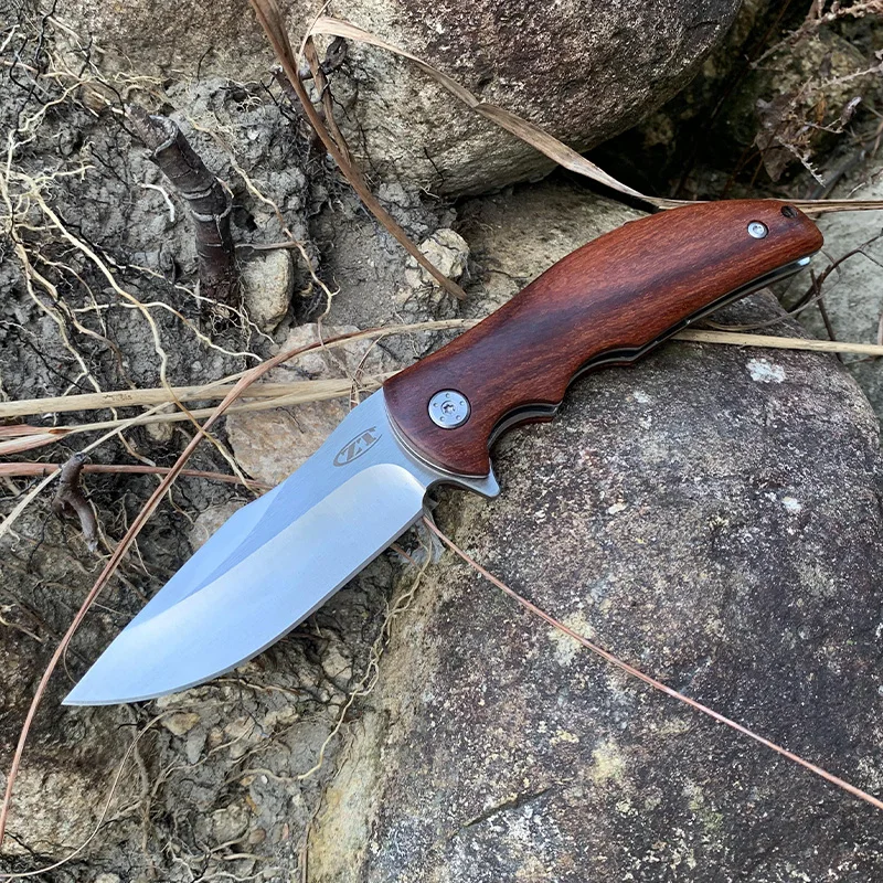 Складной нож ZT0606, тактический карманный резец с рукояткой из палисандра, для самообороны, подарок
Складной нож ZT0606, тактический карманный резец с рукояткой из палисандра, для самообороны, подарок
