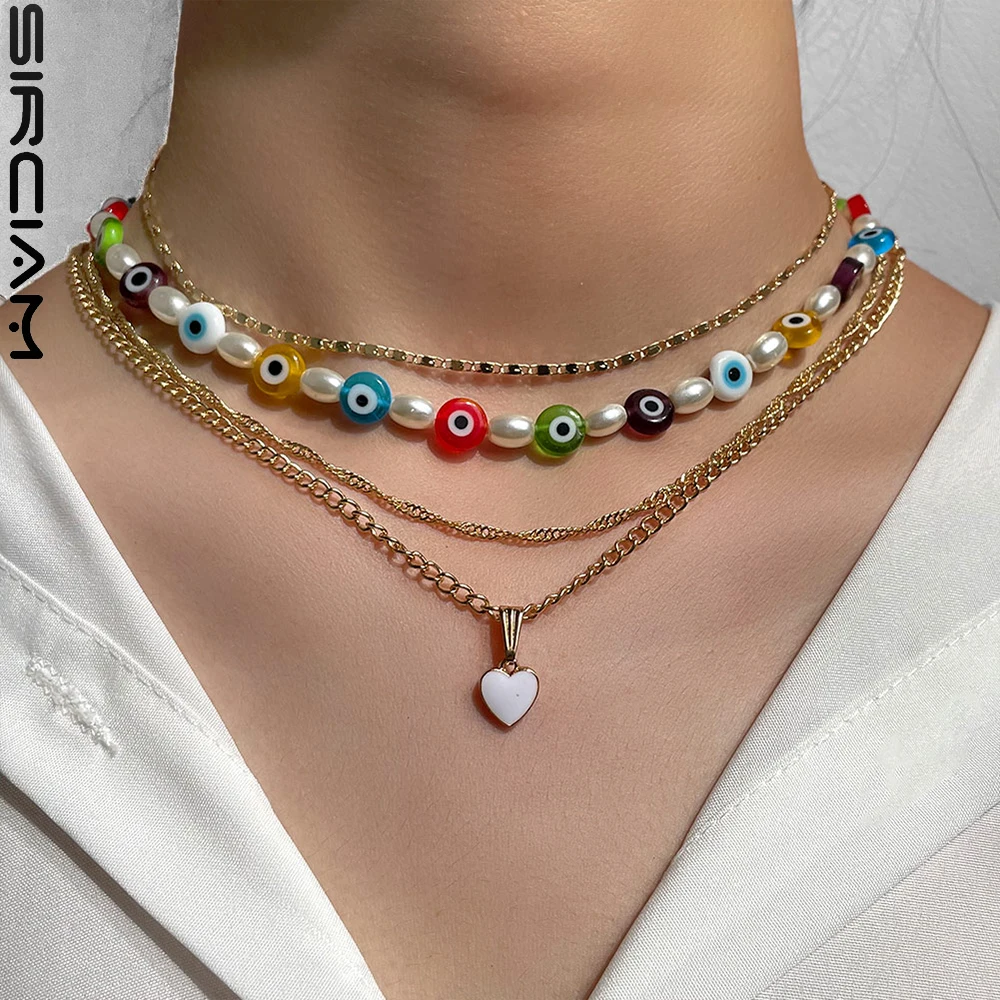 Retro Rainbow Turkey Evil Eye Pearl Beaded Necklace For Women Glass Eye Heart Pendant Metal Clavicle Chain Layered Boho Jewelry
Retro Rainbow Turkey Evil Eye Pearl Beaded Necklace For Women Glass Eye Heart Pendant Metal Clavicle Chain Layered Boho Jewelry