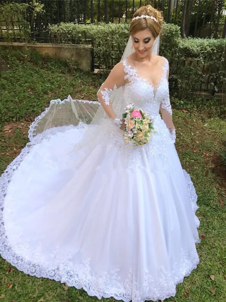 New Ball Gowns White Ivory Illusion Neck Appliques Wedding Dresses 2021 Hot Beading Bridal Dress robe de mariage LCNM99
New Ball Gowns White Ivory Illusion Neck Appliques Wedding Dresses 2021 Hot Beading Bridal Dress robe de mariage LCNM99