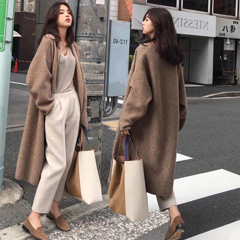 Fashion plus size loose cardigan mid-length coat sweater All-match thick windbreaker winter clothes women
Fashion plus size loose cardigan mid-length coat sweater All-match thick windbreaker winter clothes women