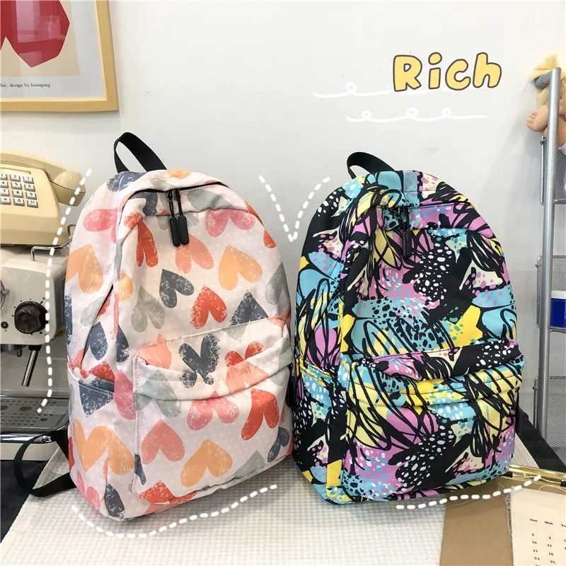 Schoolbag ins Korean junior high school student girl backpack high school student graffiti color matching lightweight backpack.
Schoolbag ins Korean junior high school student girl backpack high school student graffiti color matching lightweight backpack.