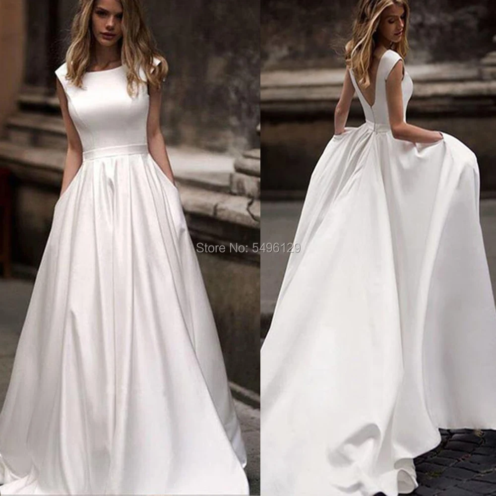 A Line Satin Wedding Dresses With Pocket 2020 Vestido de Novia White Sleeveless Bridal Gowns Formal Long Backless Bride Dress
A Line Satin Wedding Dresses With Pocket 2020 Vestido de Novia White Sleeveless Bridal Gowns Formal Long Backless Bride Dress