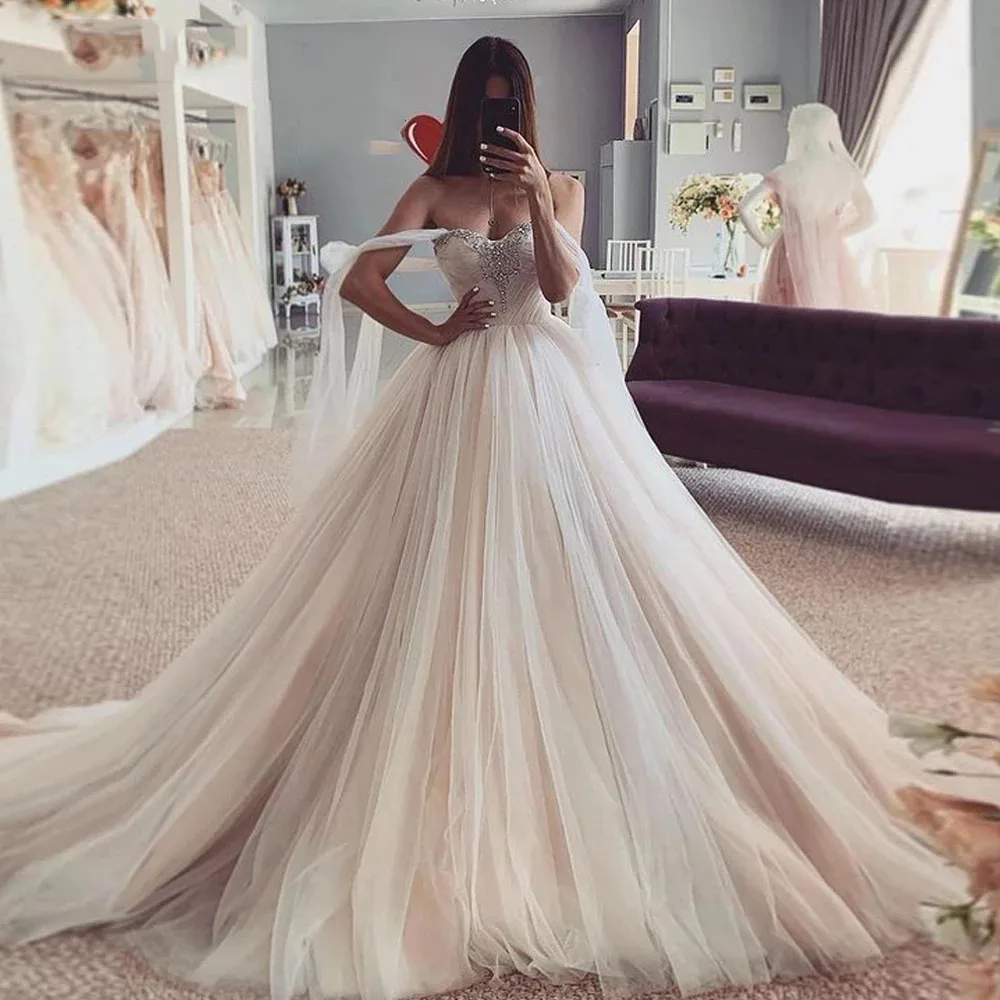 YIWUMENSA V Neck Boho Puffy Tulle Princess Wedding Dresses Off The Shoulder Crystals Beaded Women Bride Marriage Bridal Gowns
YIWUMENSA V Neck Boho Puffy Tulle Princess Wedding Dresses Off The Shoulder Crystals Beaded Women Bride Marriage Bridal Gowns