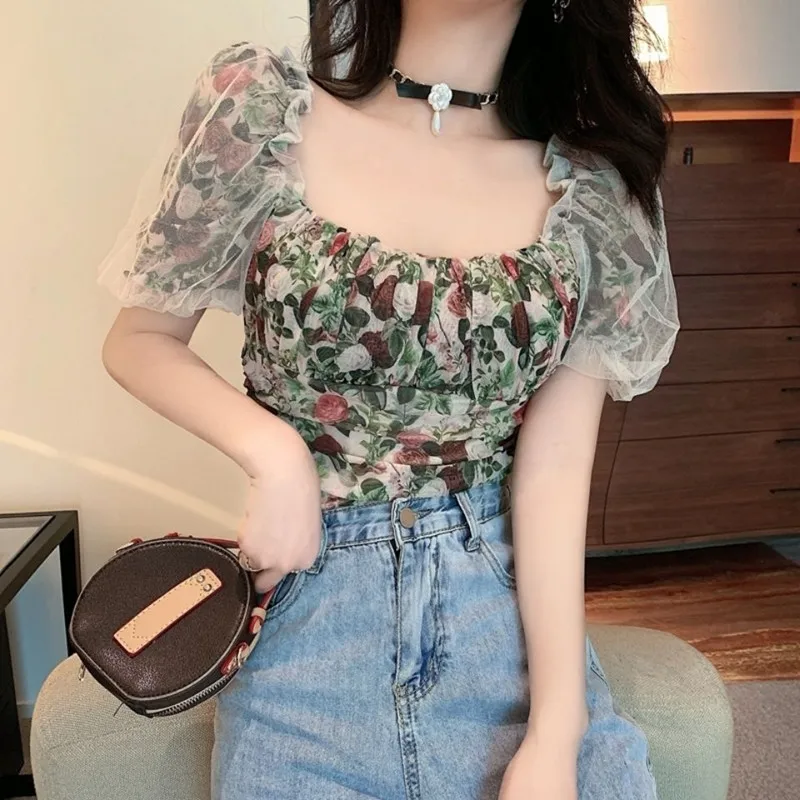 2021 Summer New Retro Floral Mesh Stitching Fashion Square Neck Bubble Sleeve Short Style Chiffon Shirt
2021 Summer New Retro Floral Mesh Stitching Fashion Square Neck Bubble Sleeve Short Style Chiffon Shirt