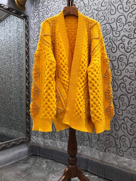 2021 new women fashion bead stitching solid color thick line sweater loose cardigan sweater 1013
2021 new women fashion bead stitching solid color thick line sweater loose cardigan sweater 1013