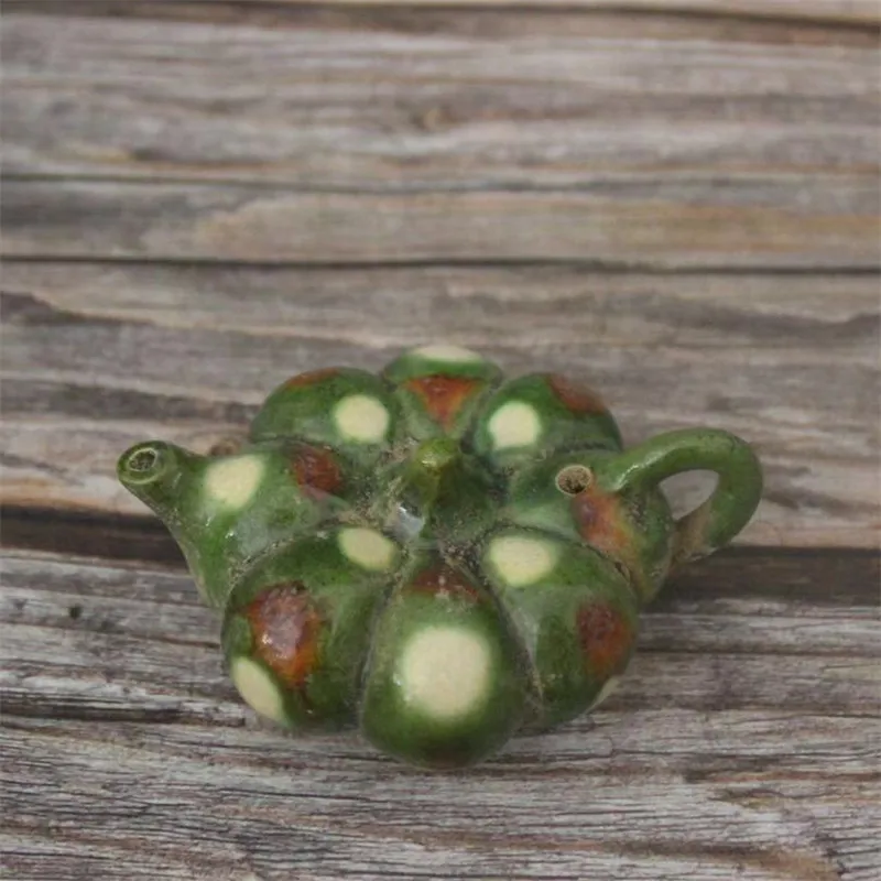 Jingdezhen antique ceramics Tang Sancai green pumpkin water drop
Jingdezhen antique ceramics Tang Sancai green pumpkin water drop