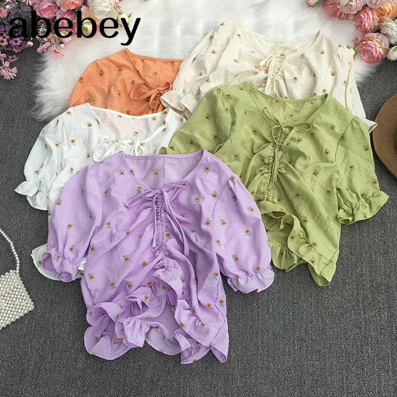 2021 New Summer Retro All-match lace up V-neck short sleeve Shirt drawstring ruched slim short Floral Shirt Top
2021 New Summer Retro All-match lace up V-neck short sleeve Shirt drawstring ruched slim short Floral Shirt Top