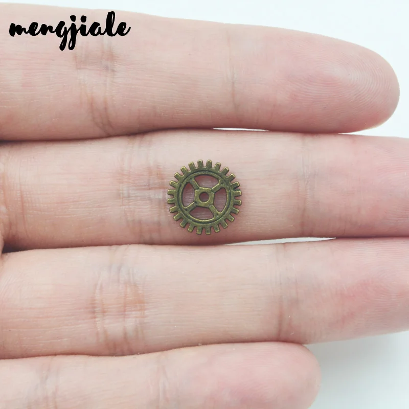 60pcs/lot 12mm Dia Small Size Antique Bronze Metal Alloy Machinery Gear Pendant Jewelry Charm Jewelry Gear Findings
60pcs/lot 12mm Dia Small Size Antique Bronze Metal Alloy Machinery Gear Pendant Jewelry Charm Jewelry Gear Findings
