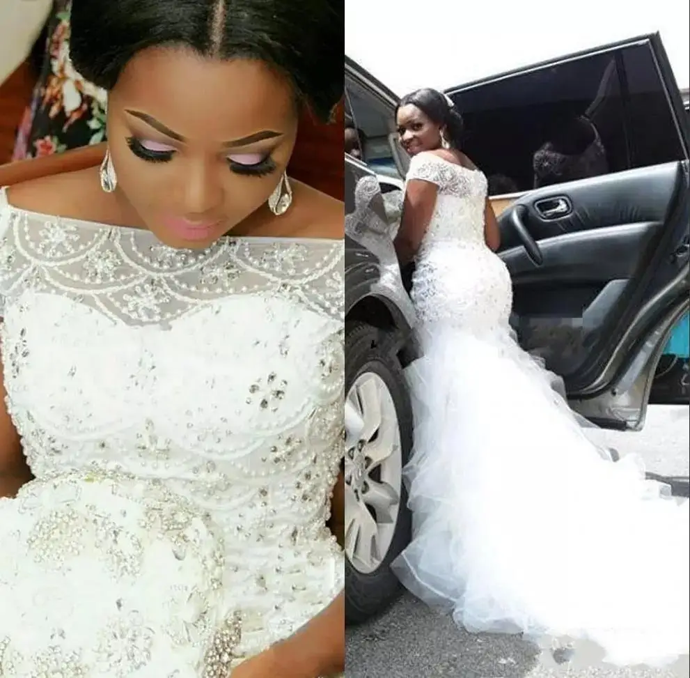Hot African Nigeria Mermaid Wedding Dresses Off Shoulder Crystal Beaded Tiered Ruffles Court Train Custom Plus Size Bride
Hot African Nigeria Mermaid Wedding Dresses Off Shoulder Crystal Beaded Tiered Ruffles Court Train Custom Plus Size Bride
