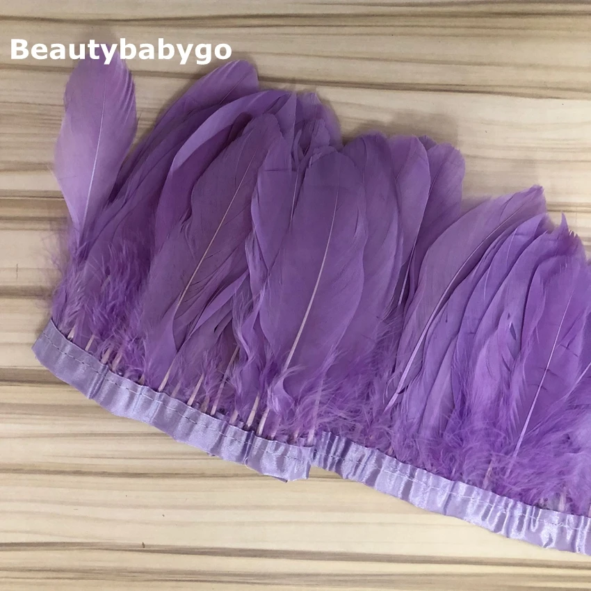 Светло-фиолетовые гусиные перья отделка 10 ярдов/партия пятнистые гусиные перья Лента 13 ~ 18 см утка перо танец DIY украшения 
Светло-фиолетовые гусиные перья отделка 10 ярдов/партия пятнистые гусиные перья Лента 13 ~ 18 см утка перо танец DIY украшения
