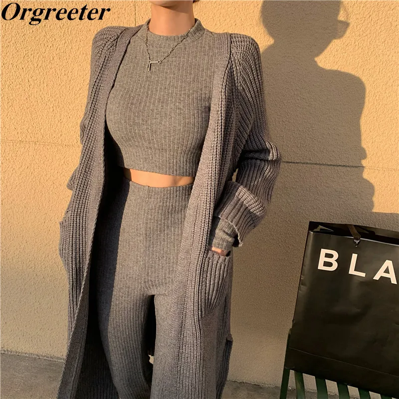 INS Fashion Tracksuit Women Long Knitted Cardigan Coat + Bottoming Cropped Top + Flared Pants Casual 3 Piece Trousers Suits
INS Fashion Tracksuit Women Long Knitted Cardigan Coat + Bottoming Cropped Top + Flared Pants Casual 3 Piece Trousers Suits
