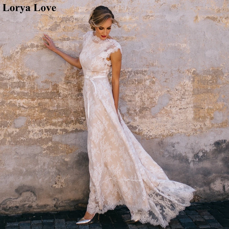 Champagne Elegant Beach Wedding Dresses 2020 Lace Appliques Boho Long Summer Backless Plus Size Bridal Gowns Vestidos De Novia
Champagne Elegant Beach Wedding Dresses 2020 Lace Appliques Boho Long Summer Backless Plus Size Bridal Gowns Vestidos De Novia