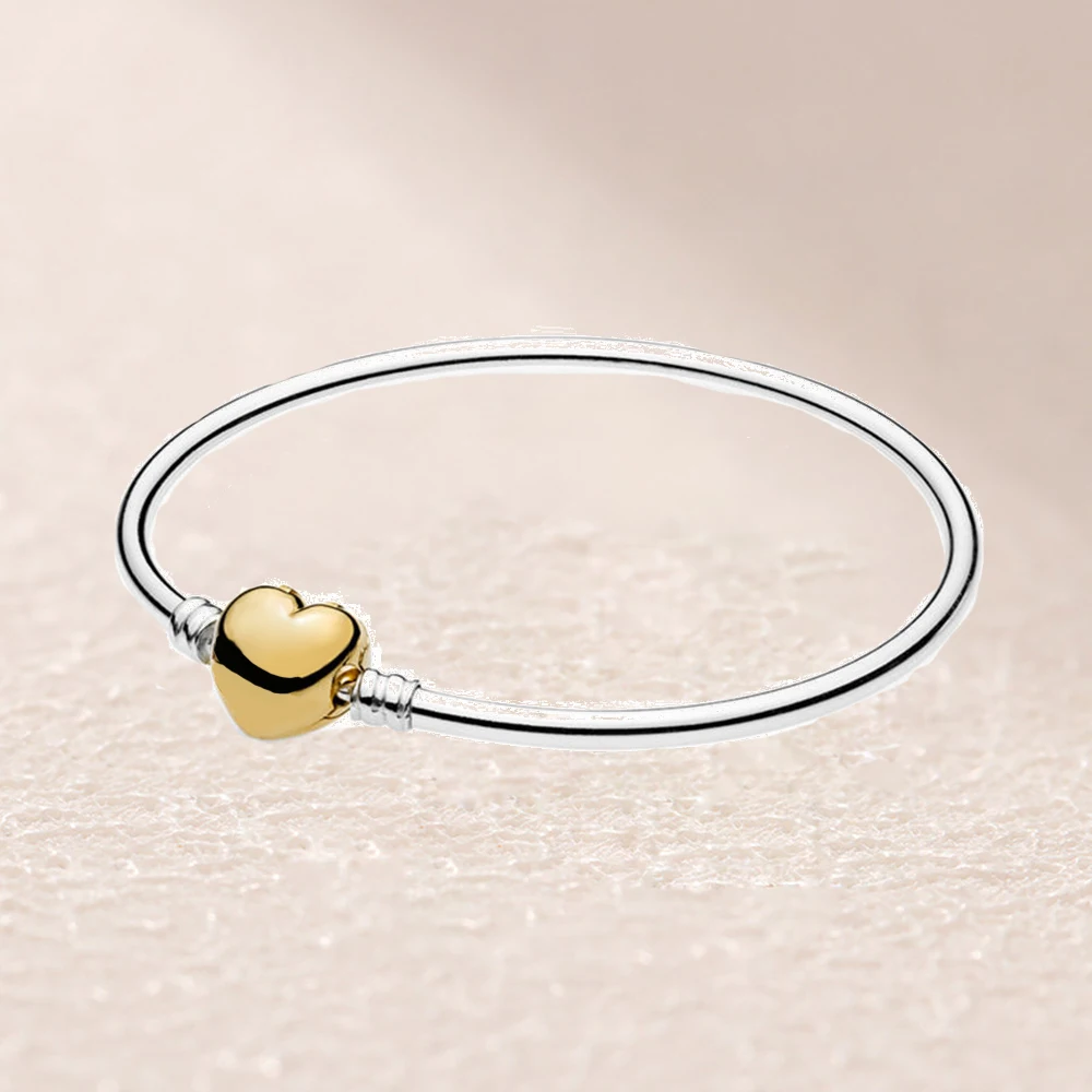 567163 SHINE STERLING SILVER BANGLE WITH HEART CLASP
567163 SHINE STERLING SILVER BANGLE WITH HEART CLASP