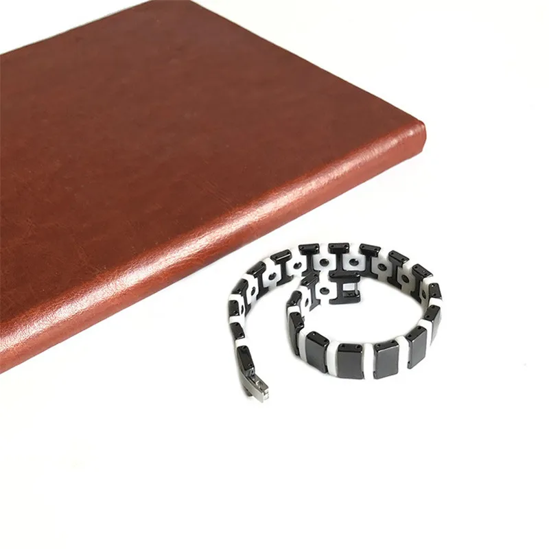 NHGBFT Classic simple black and white ceramic bracelet For Women Magnetic Energy Stone Bracelet Wedding party jewelry 
NHGBFT Classic simple black and white ceramic bracelet For Women Magnetic Energy Stone Bracelet Wedding party jewelry