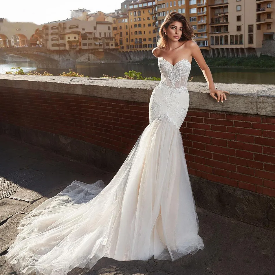Vestido de noiva Sexy Sweetheart Strapless Lace Mermaid Wedding Dress Romantic Court Train Appliques Backless Wedding Gowns
Vestido de noiva Sexy Sweetheart Strapless Lace Mermaid Wedding Dress Romantic Court Train Appliques Backless Wedding Gowns