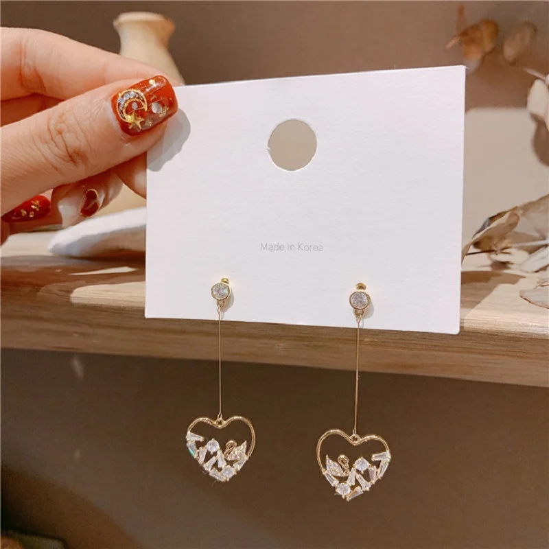 2020 New Fashion Trend Women's Earrings Simple Delicate Heart Long Drop Earrings For Women Party Girl Jewelry Gifts Wholesale
2020 New Fashion Trend Women's Earrings Simple Delicate Heart Long Drop Earrings For Women Party Girl Jewelry Gifts Wholesale