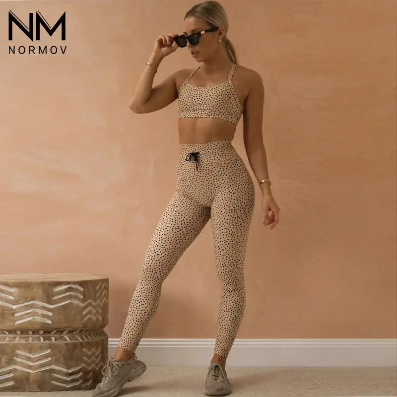 Спортивный костюм NORMOV с принтом для женщин, женский спортивный костюм для тренировок, бега, бюстгальтер, леггинсы, сексуальный комплект спо... 
Спортивный костюм NORMOV с принтом для женщин, женский спортивный костюм для тренировок, бега, бюстгальтер, леггинсы, сексуальный комплект спо...