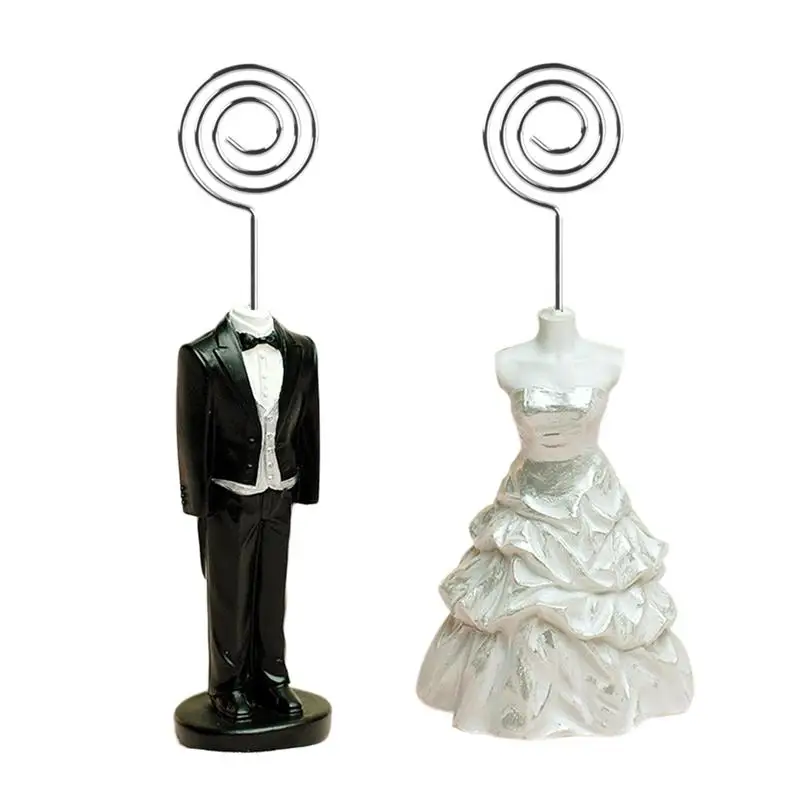 2Pcs/Set Wedding Photo Clip Table Number Stand Bride & Groom Costume Desktop Decoration Name Card Holder For Wedding Accessories
2Pcs/Set Wedding Photo Clip Table Number Stand Bride & Groom Costume Desktop Decoration Name Card Holder For Wedding Accessories