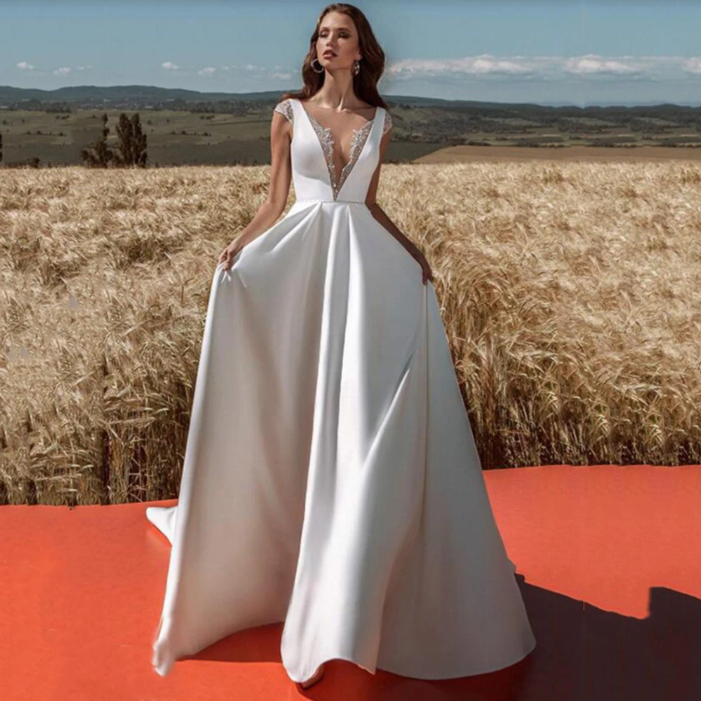 Elegant Princess Wedding Dresses A-Line Custom Made V-Neck Simple Satin Sequin Lace Long Bridal Gowns Vestido De Noiva 2021
Elegant Princess Wedding Dresses A-Line Custom Made V-Neck Simple Satin Sequin Lace Long Bridal Gowns Vestido De Noiva 2021