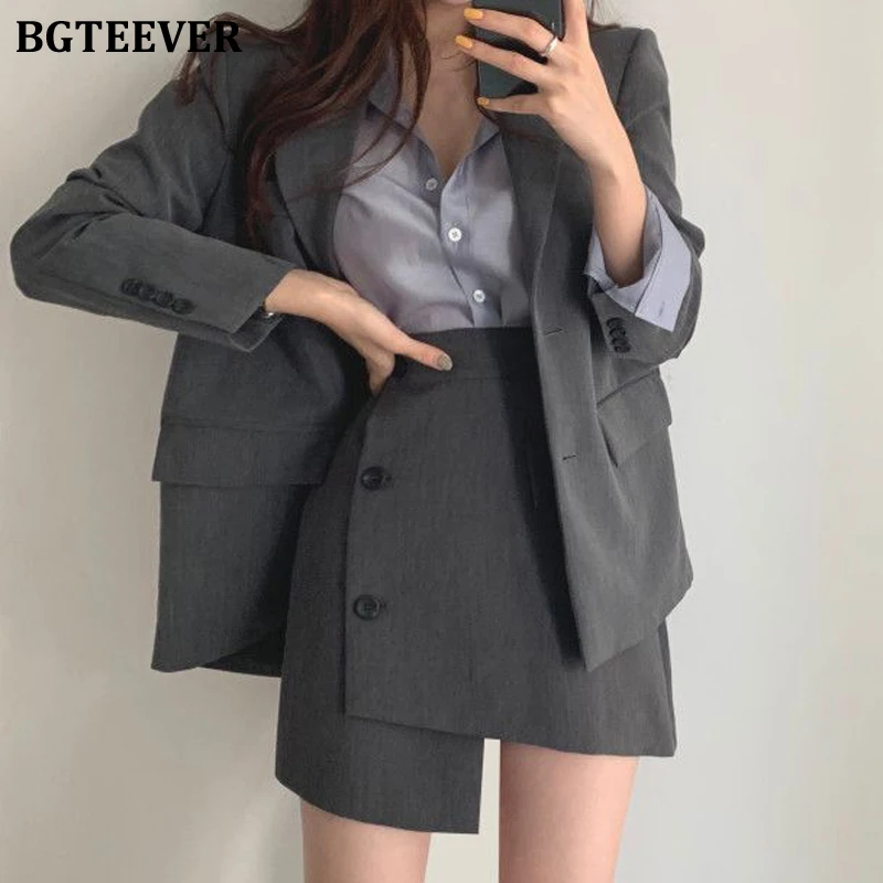 BGTEEVER Elegant Women Skirt Suits Long Sleeve Split Jacket & High Waist Buttons Irregular Mini Skirts 2021 Winter Blazer Set
BGTEEVER Elegant Women Skirt Suits Long Sleeve Split Jacket & High Waist Buttons Irregular Mini Skirts 2021 Winter Blazer Set