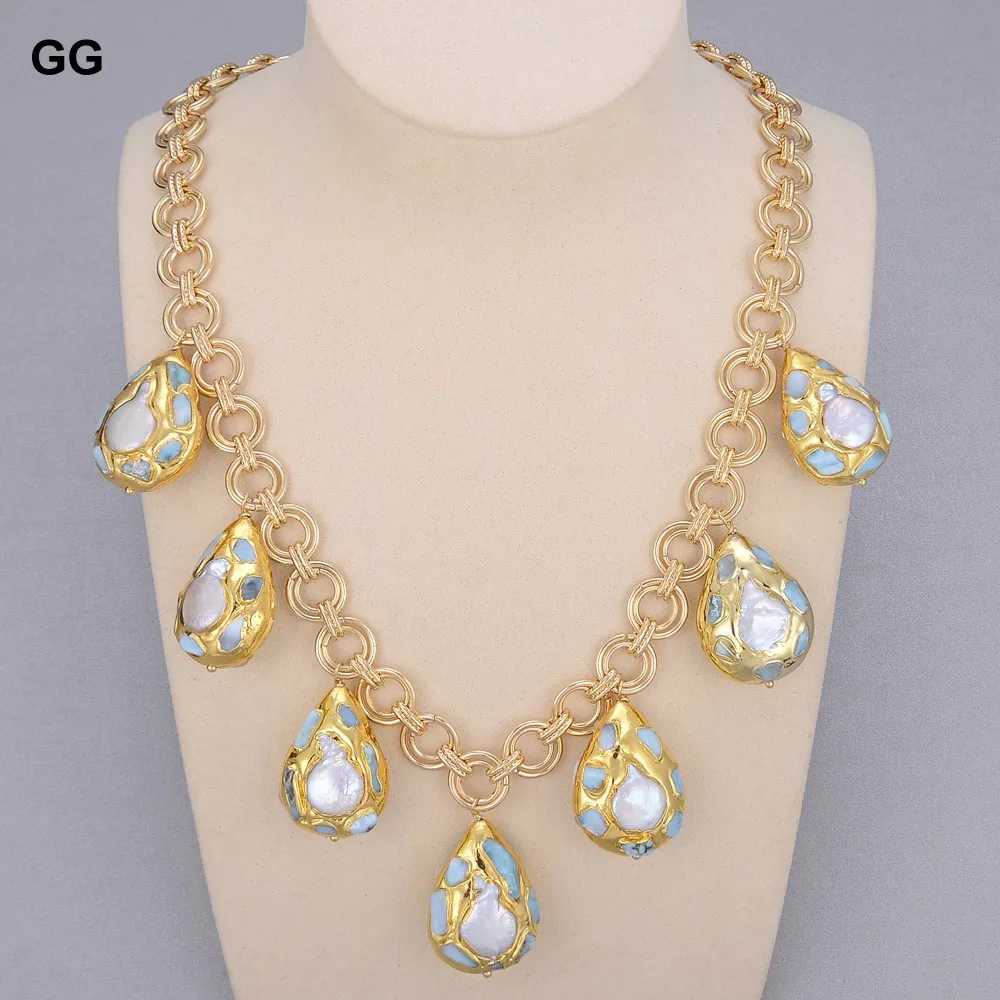 GG Jewelry 21" Blue Larimars Chips Gold Color Plated Link Chain Festoon White Coin Freshwater Pearl Pendant Necklace For Women 
GG Jewelry 21" Blue Larimars Chips Gold Color Plated Link Chain Festoon White Coin Freshwater Pearl Pendant Necklace For Women