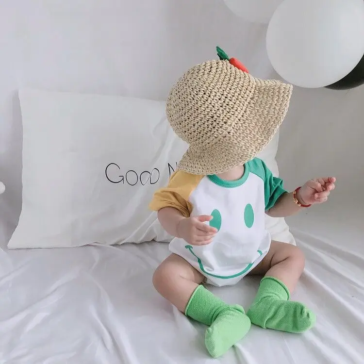Summer baby boys and girls stitched together smiley face jumpsuits crawling clothes 
Summer baby boys and girls stitched together smiley face jumpsuits crawling clothes