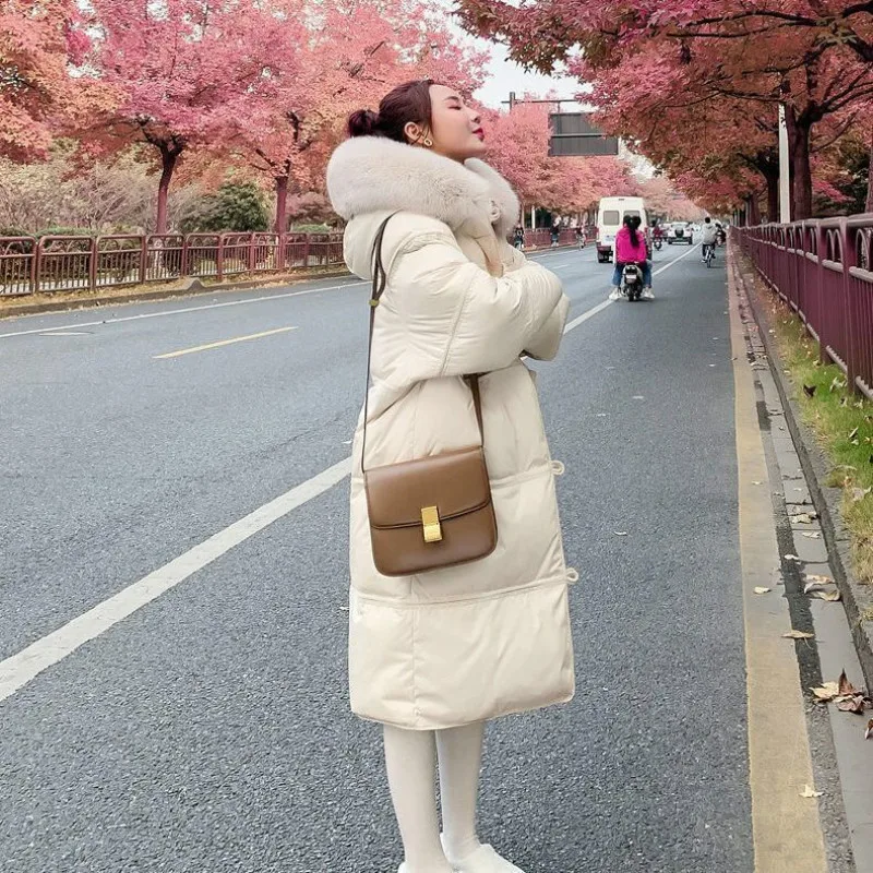 2021 Korean Winter white duck down woman Real Fox Fur Hooded cardigan zipper Parkas Warm Overcoat Natural Fur Collar Coat Y6 
2021 Korean Winter white duck down woman Real Fox Fur Hooded cardigan zipper Parkas Warm Overcoat Natural Fur Collar Coat Y6