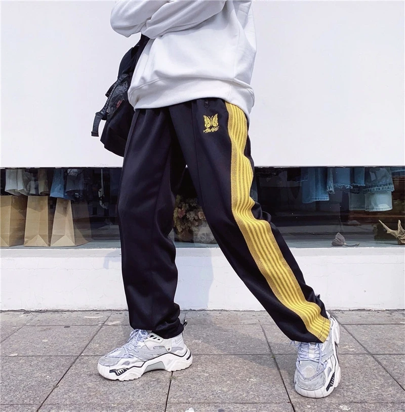 Black AWGE Needles Pants Men Women Yellow Ribbon Butterfly Embroidered Japan Needles Hip Hop Track Sweatpants Trousers Joggers
Black AWGE Needles Pants Men Women Yellow Ribbon Butterfly Embroidered Japan Needles Hip Hop Track Sweatpants Trousers Joggers