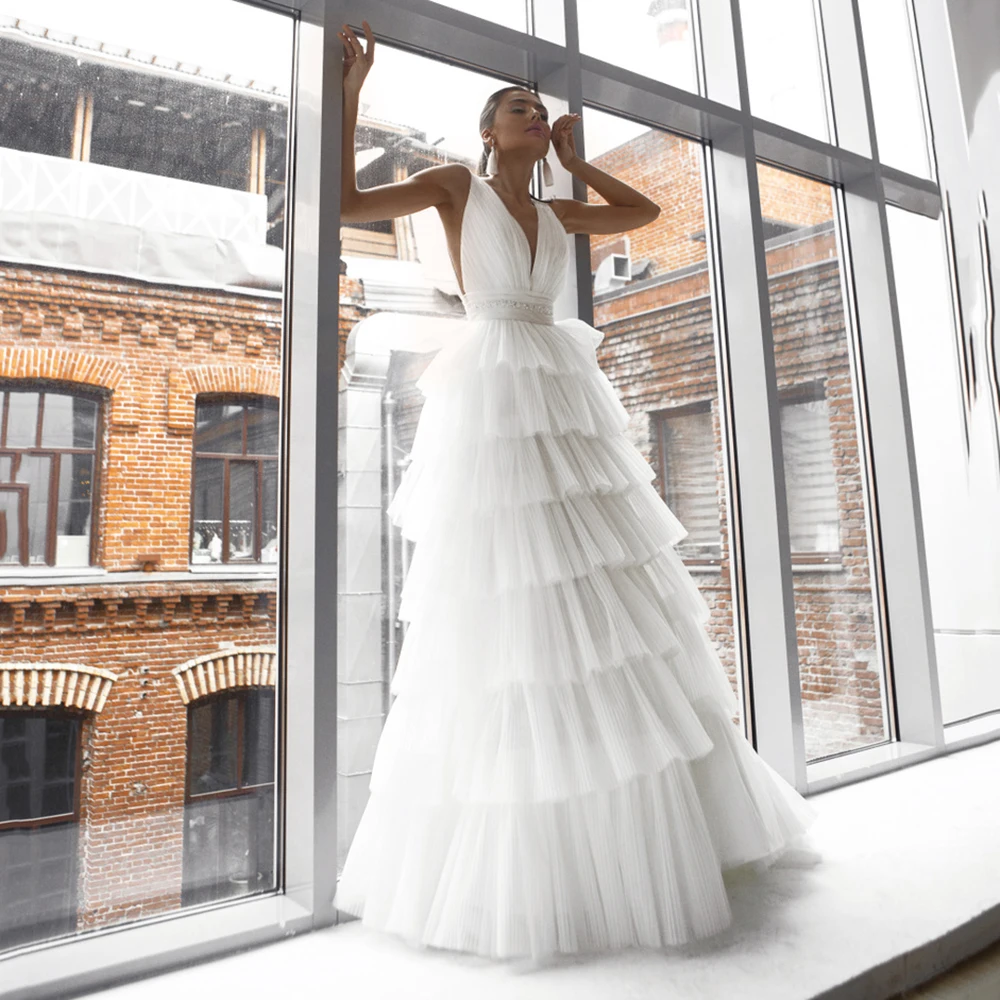 UZN Elegant Ivory A-Line Organza Wedding Dress V-Neck Pleated Tiered Bridal Gown With Zipper Beading Belt Brides Dress
UZN Elegant Ivory A-Line Organza Wedding Dress V-Neck Pleated Tiered Bridal Gown With Zipper Beading Belt Brides Dress