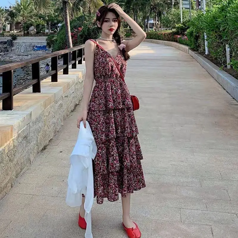 

Spring and Summer New Temperament V-neck Chiffon Cake Female Han Edition Dress Chic Show Thin Broken Beautiful Condole Belt