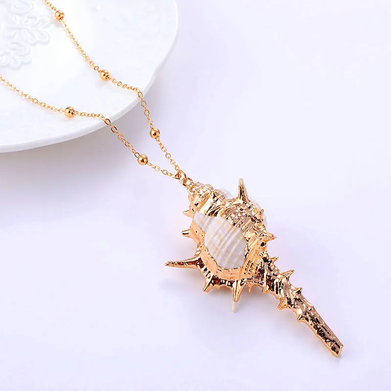 2019 NEW Vintage Bohemian Ocean Gold Beads Cowrie Shell Conch Pendant Necklace Women Long Choker Necklaces Fashion Jewelry
2019 NEW Vintage Bohemian Ocean Gold Beads Cowrie Shell Conch Pendant Necklace Women Long Choker Necklaces Fashion Jewelry