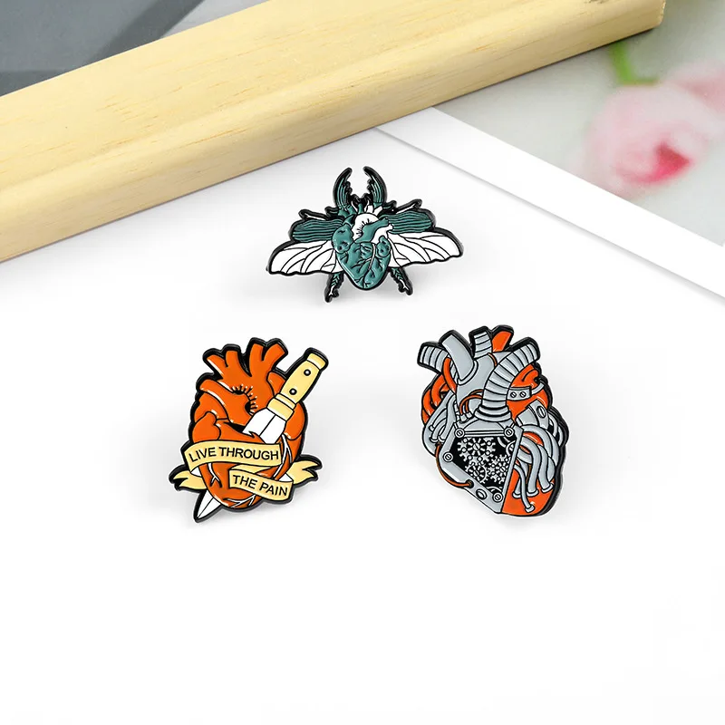 Creative Dagger Heart Brooch Mechanical Heart Brooch Backpack Badge New Heart Insect Brooch Creative Heart Pins Lapel Pins
Creative Dagger Heart Brooch Mechanical Heart Brooch Backpack Badge New Heart Insect Brooch Creative Heart Pins Lapel Pins