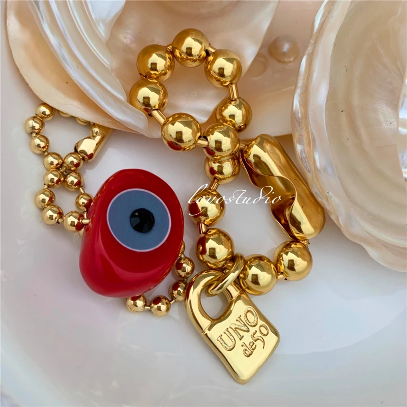 Vintage Geometric Resin Eyes Golden Metal Lock Pendant Bracelets Retro Beaded Bracelet Women Girl Trendy Jewelry HUANZHI 2021
Vintage Geometric Resin Eyes Golden Metal Lock Pendant Bracelets Retro Beaded Bracelet Women Girl Trendy Jewelry HUANZHI 2021