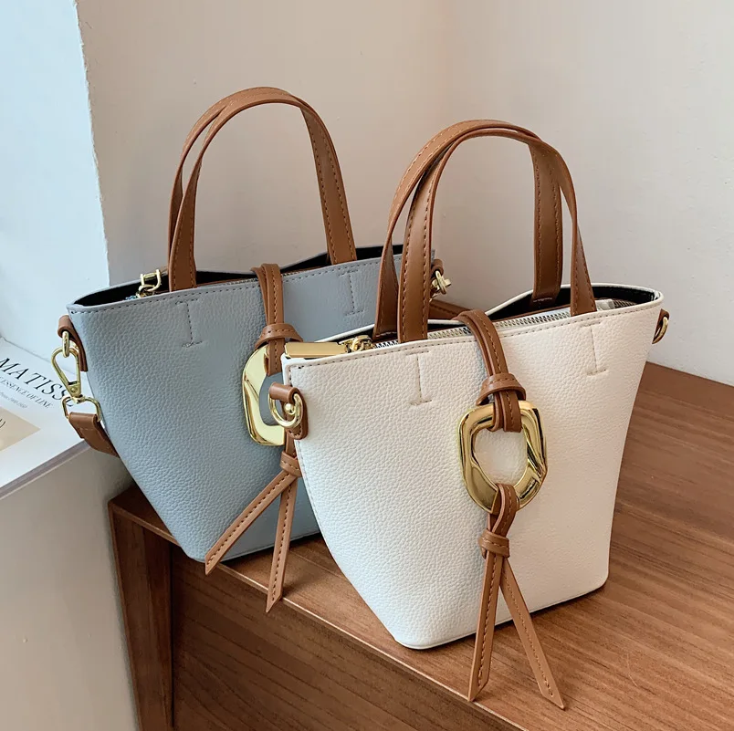 Popular European and American Bags 2021 New Trendy High-quality Ladies Luxury All-match Portable Bucket Bag Shoulder Messenger
Popular European and American Bags 2021 New Trendy High-quality Ladies Luxury All-match Portable Bucket Bag Shoulder Messenger