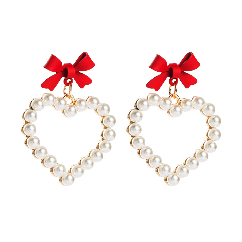 2020 Lovely Heart Shaped Imitation Pearl Dangle Earrings Women's Beautiful Bow Christmas Earrings Classic Christmas Party Gift
2020 Lovely Heart Shaped Imitation Pearl Dangle Earrings Women's Beautiful Bow Christmas Earrings Classic Christmas Party Gift