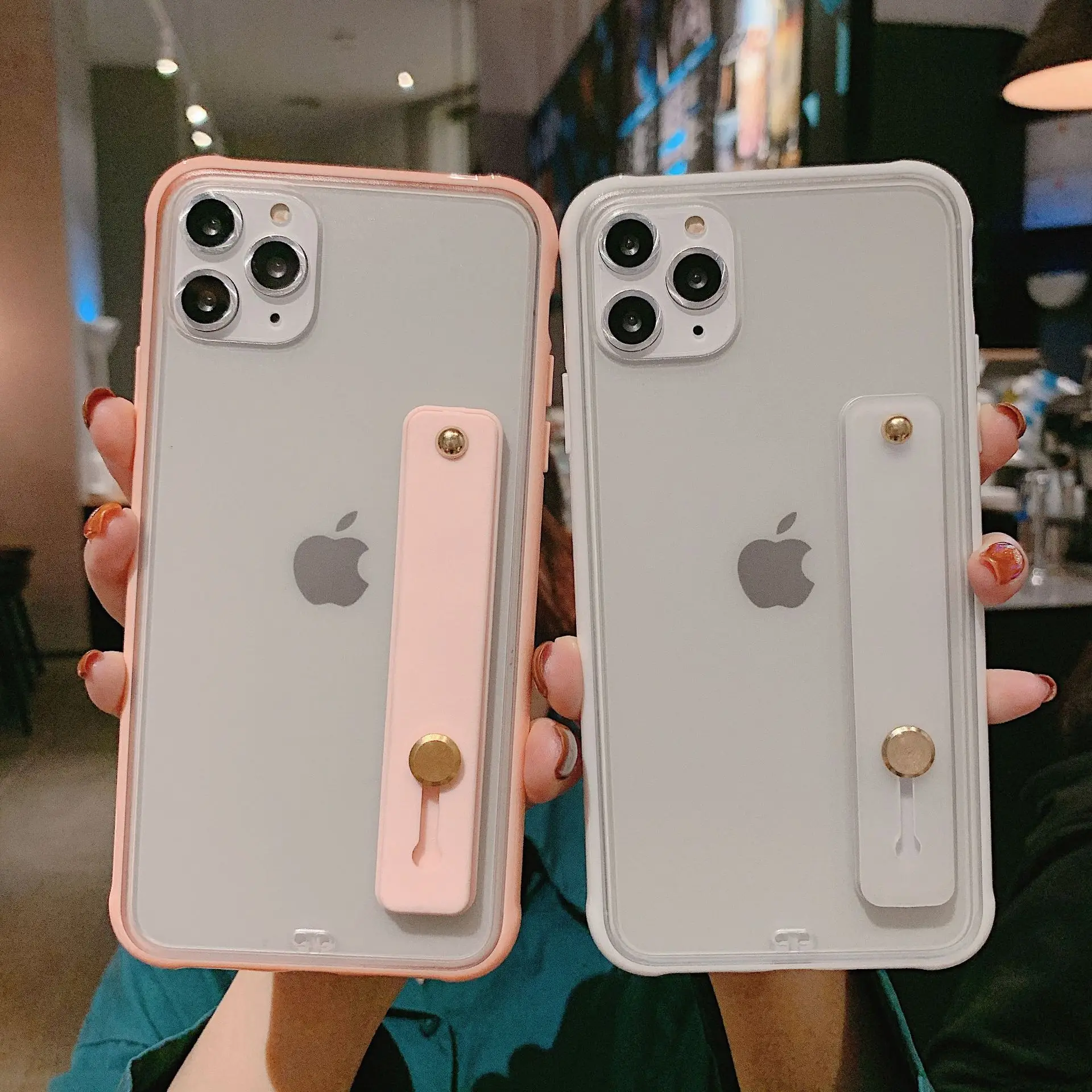 New Clear For iPhone 11 Wrist Strap Phone Holder Case For iPhone 12 Mini 12 Pro Max XR XS Max X 7 8 Plus Shockproof Bumper Shell
New Clear For iPhone 11 Wrist Strap Phone Holder Case For iPhone 12 Mini 12 Pro Max XR XS Max X 7 8 Plus Shockproof Bumper Shell